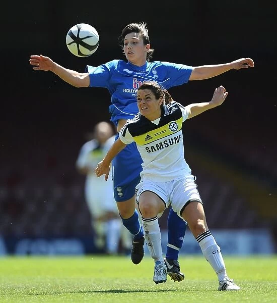 Battling for the FA Cup: A Riveting Moment between Rachel Williams of Birmingham City and Claire Rafferty of Chelsea