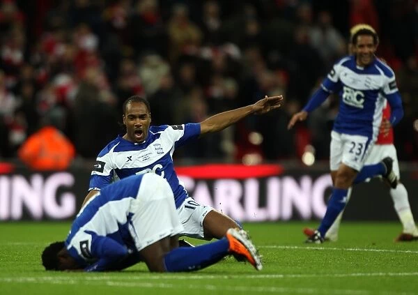 Celebrating Glory: Jerome and Martins Triumphant Moment at Birmingham City's Carling Cup Final vs. Arsenal at Wembley Stadium