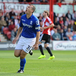 Paul Caddis Scores Birmingham City's Thrilling Penalty Goal: Sky Bet Championship's Exciting Opening Moment at Griffin Park