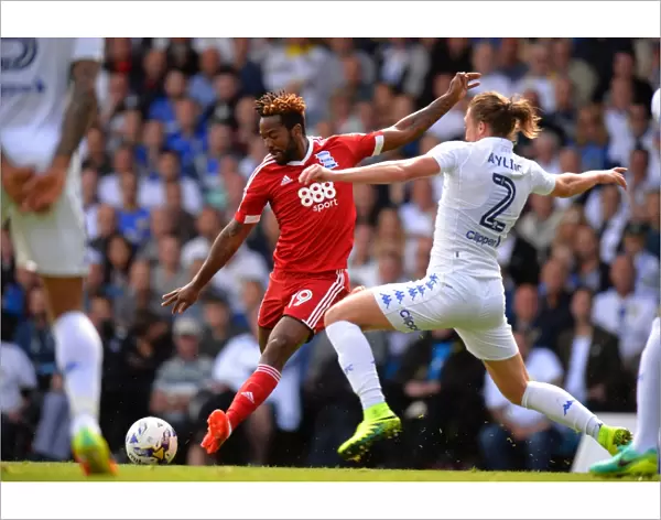 Leeds United vs. Birmingham City: Ayling Tackles Maghoma in Championship Showdown (Sky Bet Championship)