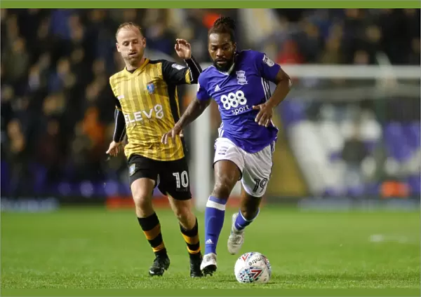 Battle for the Ball: Maghoma vs. Bannan in Sky Bet Championship Clash at St. Andrew's (Birmingham City vs. Sheffield Wednesday, 2017-18)