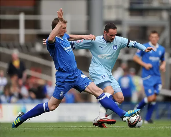 Caldwell vs Bell: Intense Rivalry in Birmingham City vs Coventry City Clash (Npower Championship, August 13, 2011)