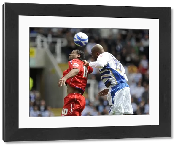Battle for the Ball: Duberry vs. Jerome in the Intense Championship Clash between Birmingham City and Reading (2009)