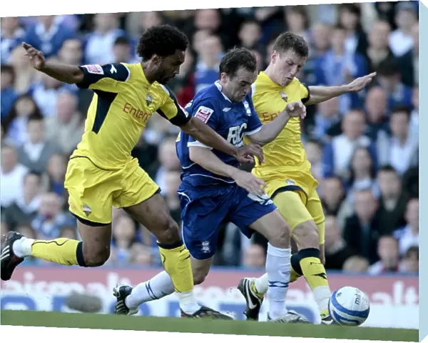 Tight Battle: McFadden Surrounded by Mawene and Sedgwick (Birmingham City vs Preston North End, Championship 2009)