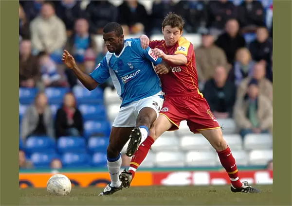 Battling for the FA Cup: A Rivalry Between John Oster (Birmingham City) and Fabrice Muamba (Reading) (FA Cup Round 4, St. Andrew's, 2007)