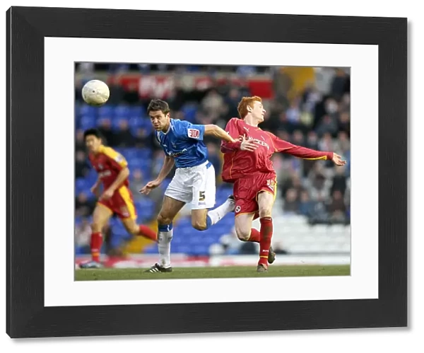 Birmingham City vs. Reading: A FA Cup Showdown - Upson vs. Kitson's Intense Battle for Ball Possession (FA Cup Round 4, 2007)
