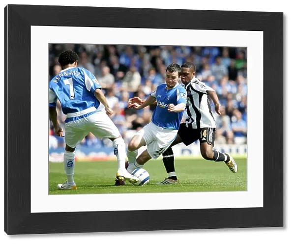 Clash at St. Andrew's: A Battle Between Zogbia and Johnson - Birmingham City vs. Newcastle United (2006)