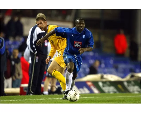 Olivier Tebily Outsmarts Richard Cresswell: A Pivotal Moment in Birmingham City's 2002 Worthington Cup Battle Against Preston North End