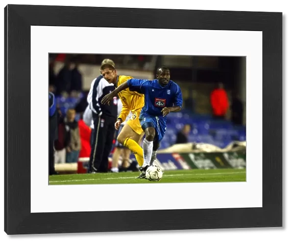 Olivier Tebily Outsmarts Richard Cresswell: A Pivotal Moment in Birmingham City's 2002 Worthington Cup Battle Against Preston North End