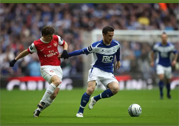 Battleground Wembley: Ferguson vs. Arshavin - Birmingham City vs. Arsenal in the Carling Cup Final: A Clash of Titans