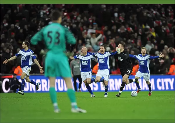 Birmingham City's Carling Cup Triumph: Szczesny's Disappointment Amidst Opponents Jubilant Goal Celebrations
