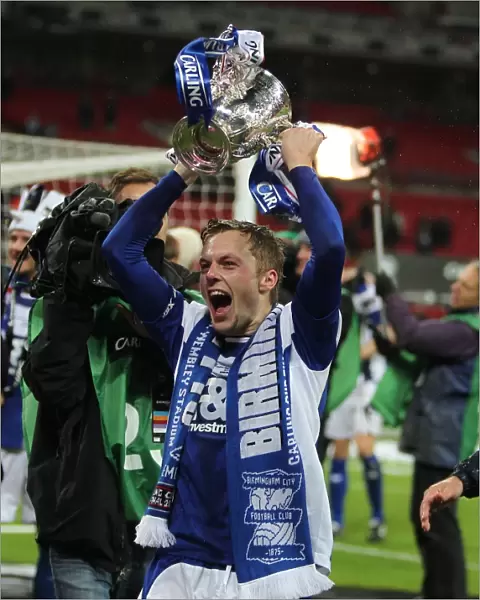 Birmingham City FC's Sebastian Larsson Triumphs in the Carling Cup Final at Wembley: Holding the Trophy