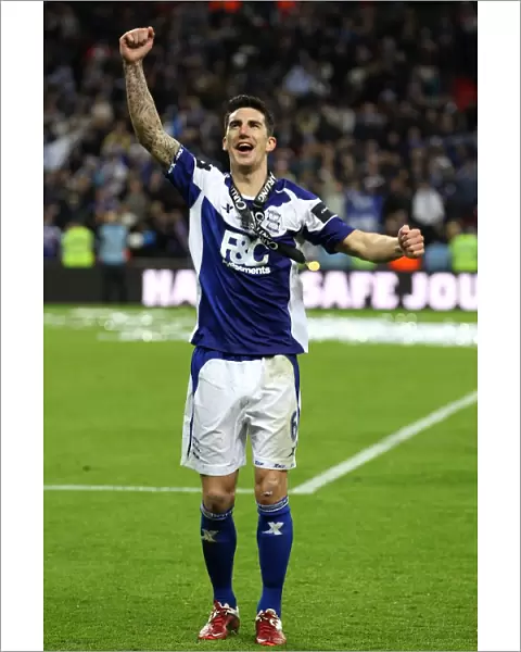 Birmingham City FC: Liam Ridgewell's Triumphant Moment at the Carling Cup Final - Celebrating Victory against Arsenal at Wembley Stadium
