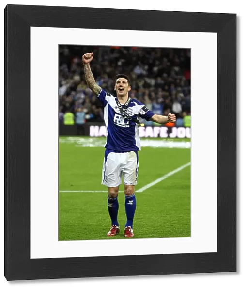 Birmingham City FC: Liam Ridgewell's Triumphant Moment at the Carling Cup Final - Celebrating Victory against Arsenal at Wembley Stadium