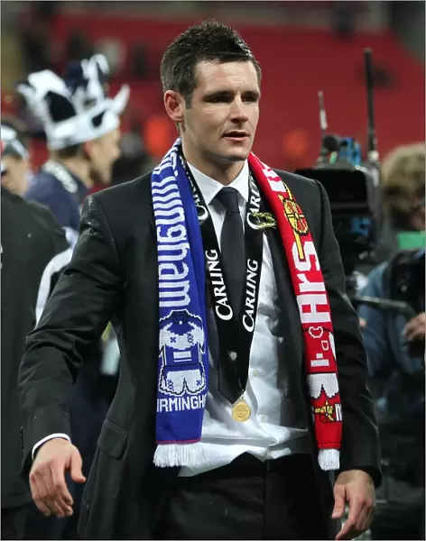 Scott Dann's Triumph: Birmingham City's Carling Cup Victory at Wembley - A Celebration with the Winning Medal