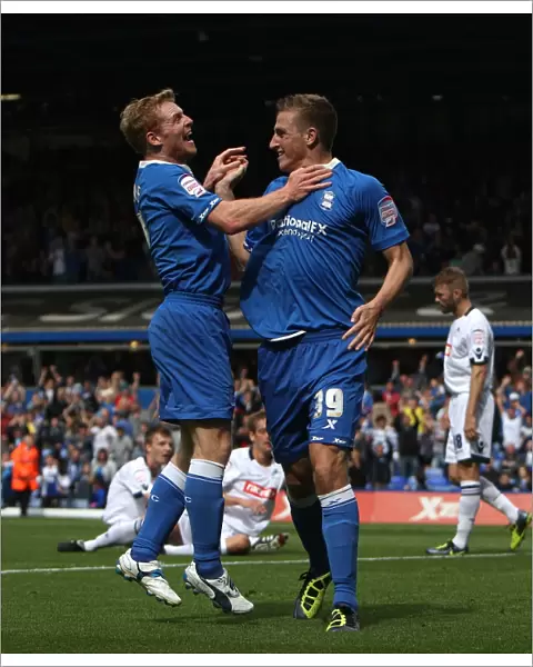 Chris Wood and Chris Burke's Jubilant Moment: Birmingham City's First Goal Against Disappointed Millwall (Npower Championship, September 11, 2011)