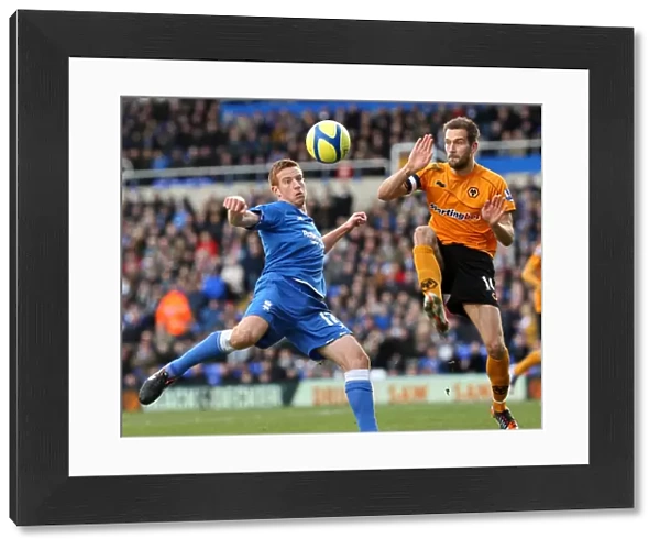 Airtight FA Cup Showdown: Rooney vs. Johnson's Heading Battle - Birmingham City vs. Wolverhampton Wanderers (January 7, 2012)