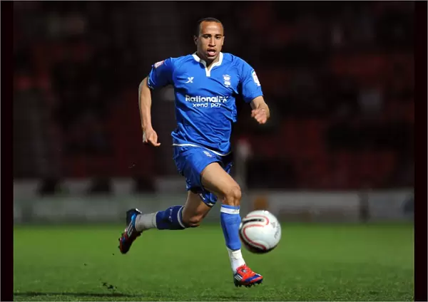 Birmingham Citys Andros Townsend with the ball during the npower Championship match at the Keepmoat Stadium, Doncaster