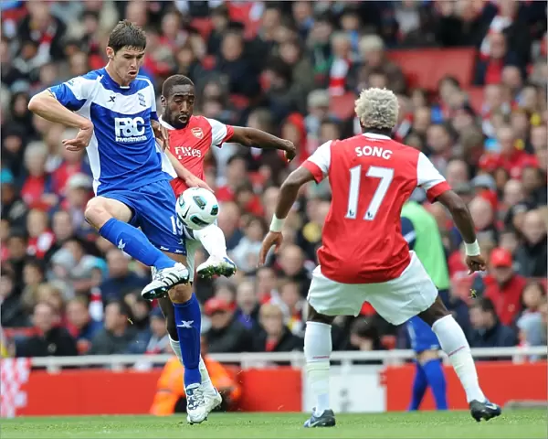 Intense Battle: Nikola Zigic vs Johan Djourou - Birmingham City vs Arsenal (Barclays Premier League, October 16, 2010)