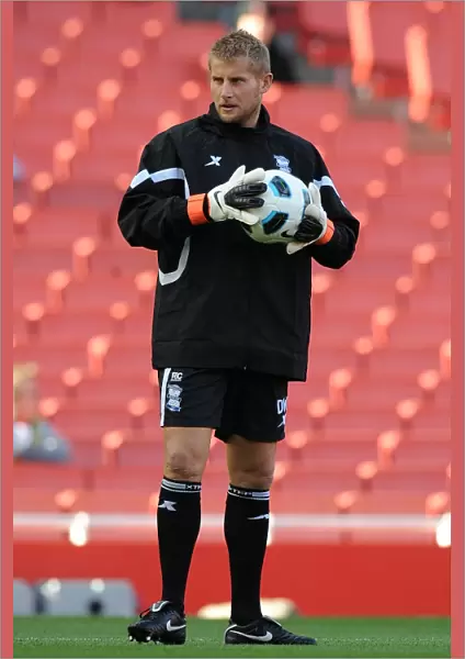 Dave Watson vs. Arsenal: Birmingham City's Goalkeeping Coach Faces Off in the Barclays Premier League (16-10-2010) at Emirates Stadium