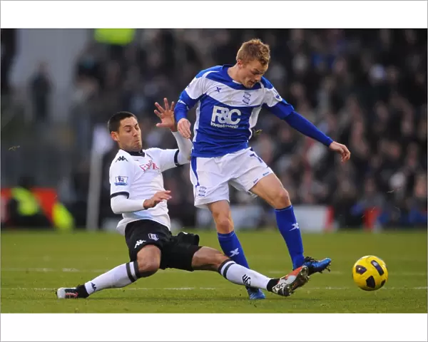 Battling for Control: Larsson vs. Dempsey - A Premier League Showdown (November 2010, Fulham vs. Birmingham City)