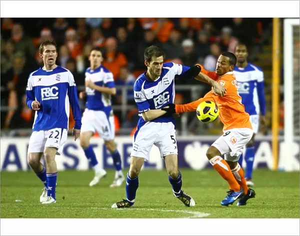 Intense Rivalry: Johnson vs Campbell - A Battle for the Ball (Birmingham City vs Blackpool, Premier League, 04-01-2011)