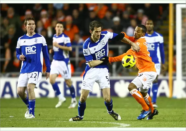 Intense Rivalry: Johnson vs Campbell - A Battle for the Ball (Birmingham City vs Blackpool, Premier League, 04-01-2011)