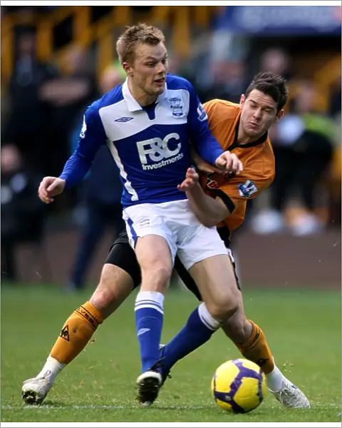 Battling for Supremacy: Larsson vs. Jarvis - A Premier League Rivalry Erupts (November 2009, Molineux)