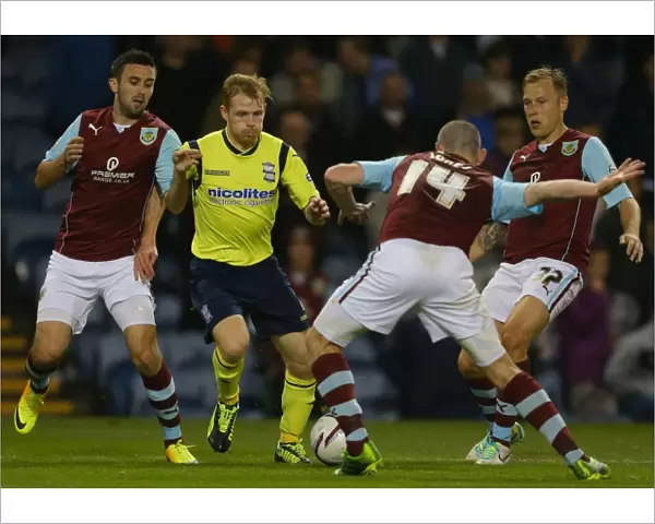 Burnley's Defensive Wall Stands Firm Against Birmingham City's Chris Burke