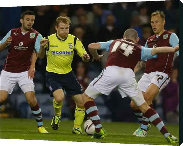 Burnley's Defensive Wall Stands Firm Against Birmingham City's Chris Burke