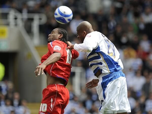 Battle for the Ball: Duberry vs. Jerome in the Intense Championship Clash between Birmingham City and Reading (2009)