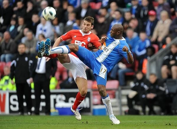 Battling for Control: David Bentley vs. Emmerson Boyce - A Premier League Showdown (19-03-2011)