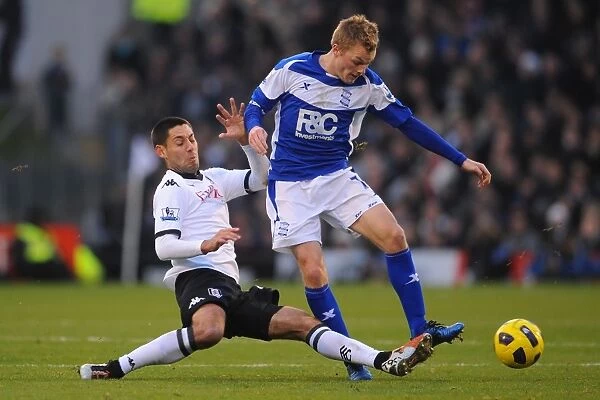 Battling for Control: Larsson vs. Dempsey - A Premier League Showdown (November 2010, Fulham vs. Birmingham City)