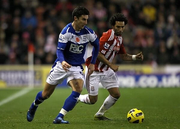 Battling for Control: Ridgewell vs. Pennant in the Intense Barclays Premier League Clash between Birmingham City and Stoke City (09-11-2010)