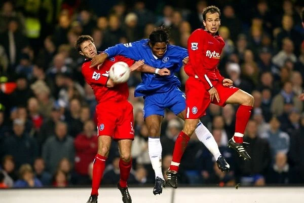 Battling for the FA Cup: Drogba's Tussle with Upson and Clemence (2005) - Chelsea vs. Birmingham City