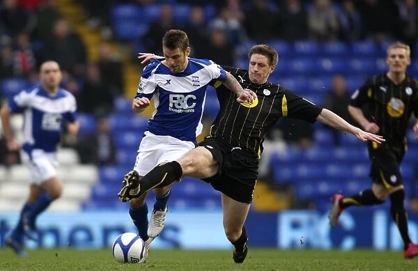 Battling for FA Cup Glory: David Bentley vs. Richard Hinds - Birmingham City vs. Sheffield Wednesday (FA Cup Round 5, 19-02-2011)
