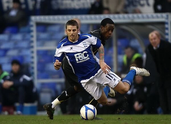 Battling for FA Cup Glory: Osbourne vs. Bentley - A Riveting Rivalry in Birmingham City vs. Sheffield Wednesday (FA Cup Round 5, 2011)