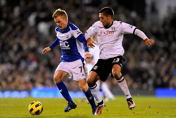 Battling for Supremacy: Larsson vs. Dempsey - A Premier League Clash (November 2010)