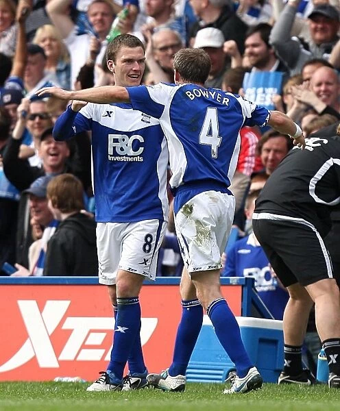 Birmingham City FC: Craig Gardner and Lee Bowyer's Euphoric Moment as They Celebrate the Second Goal Against Sunderland in the Barclays Premier League (April 16, 2011)