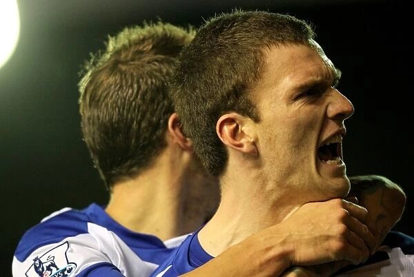 Birmingham City FC: Euphoria Unleashed - Bentley and Gardner's Unforgettable Moment as They Celebrate the Second Goal Against Manchester City (BPL, 02-02-2011)