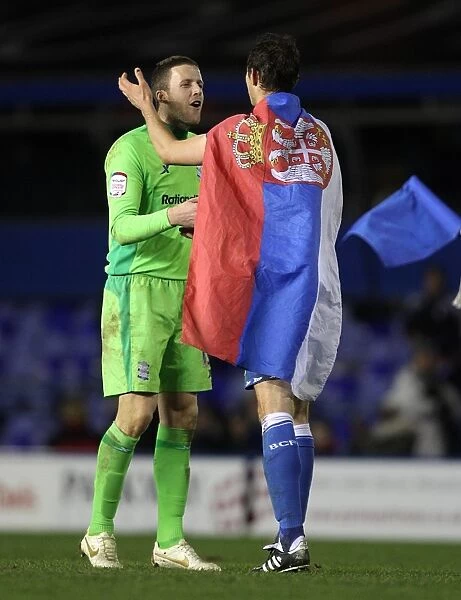 Birmingham City FC: A Heartfelt Moment between Nikola Zigic and Colin Doyle after their Hard-Fought Victory over Ipswich Town (Npower Championship, 11-01-2012)