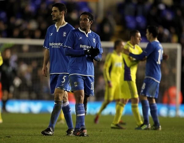 Birmingham City FC: Pablo Ibanez and Morgaro Gomis Embrace - UEFA Europa League Group H, 15-12-2011 (vs NK Maribor)