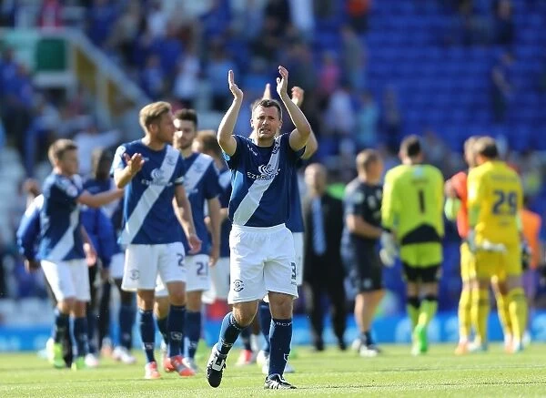 Birmingham City FC: Paul Caddis Triumphant Moment - Celebrating Championship Victory over Reading
