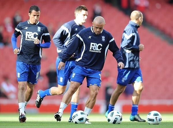 Birmingham City FC: Stephen Carr and Team's Pre-Match Warm-Up at Emirates Stadium vs. Arsenal (Barclays Premier League, October 16, 2010)