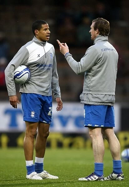Birmingham City FC: Steven Caldwell and Curtis Davies in Deep Conversation during Warm-up at Turf Moor (Championship 2011-2012)