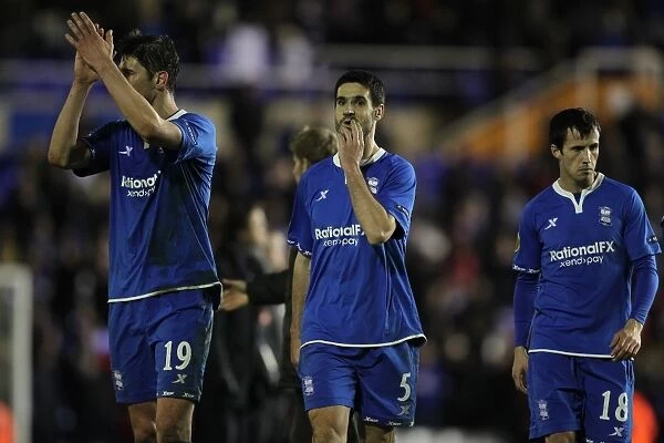 Birmingham City FC's Europa League Triumph: Zigic, Ibanez, and Fahey Celebrate Victory over NK Maribor (December 2011)