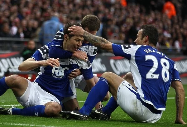 Birmingham City FC's Thrilling Goal Celebration: Nikola Zigic Scores the Opener in Carling Cup Final Victory over Arsenal at Wembley Stadium