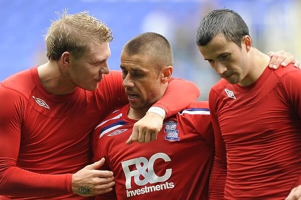 Birmingham City FC's Triumph: Garry O'Connor, Kevin Phillips, and Keith Fahey Celebrate Promotion to Championship (03-05-2009)