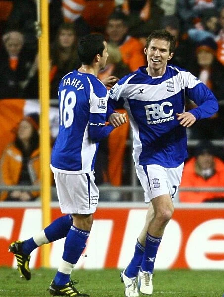 Birmingham City: Hleb and Fahey Celebrate Opening Goal in Premier League Match Against Blackpool (04-01-2011)