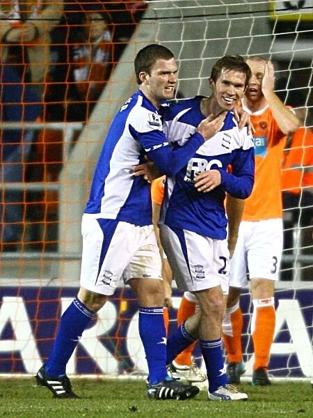 Birmingham City: Hleb and Gardner Celebrate Opening Goal in Premier League Win Against Blackpool (04-01-2011)